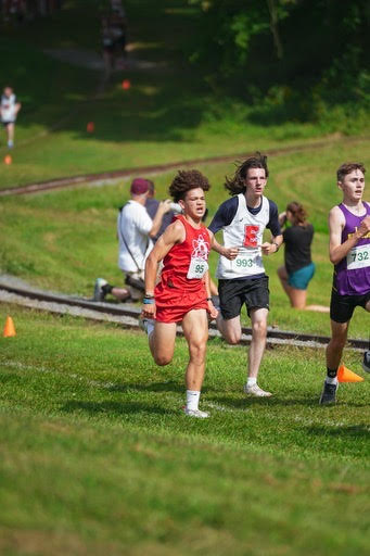 Sophomore Noah Henderson running neck and neck with other schools