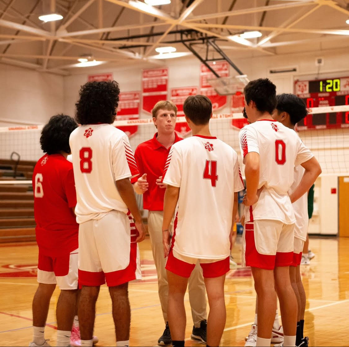 The boys Volleyball getting coached by Willem Hawthorne