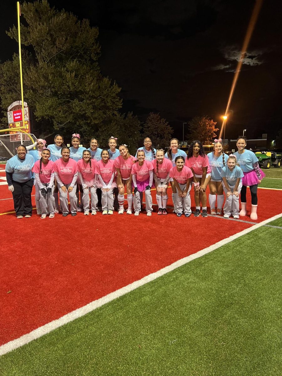 The atoms girls field hockey team celebrates their senior night