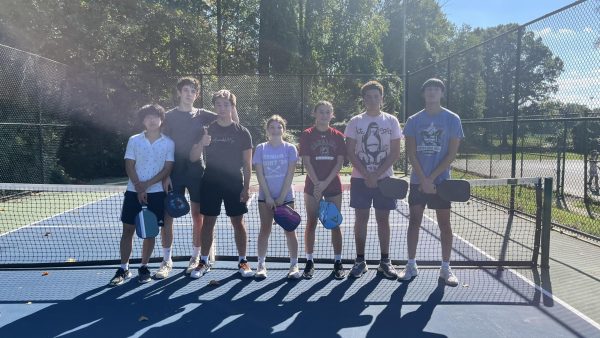 The Atoms Pickleball Club poses for a photo after practice