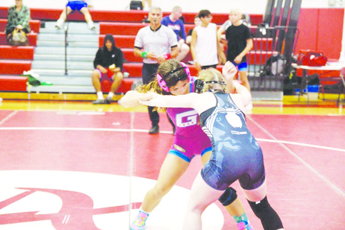 Junior Anatolia Jenson wrestles in a off season tournament. 