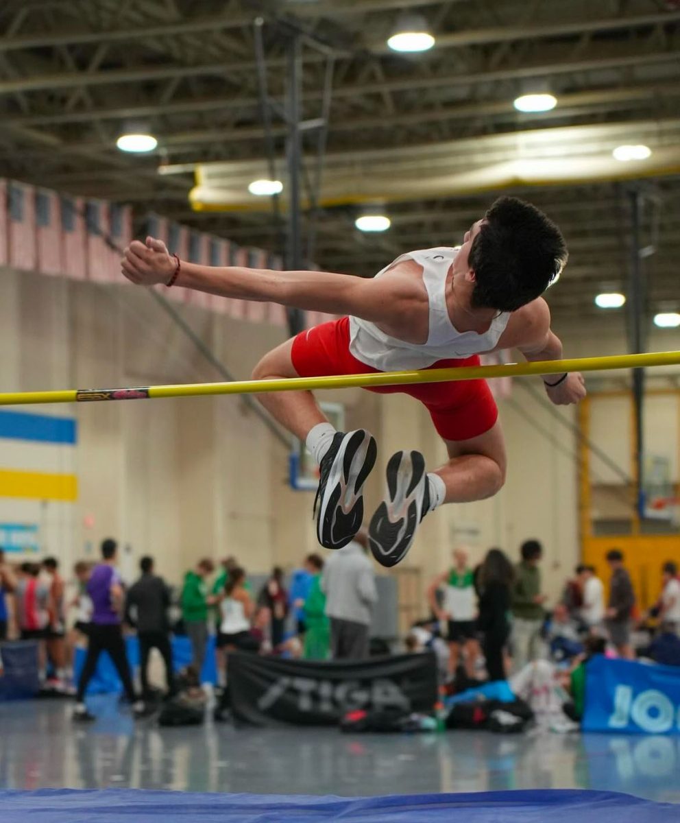 Logan Noyes doing the high jump at Thomas Jefferson Community Center