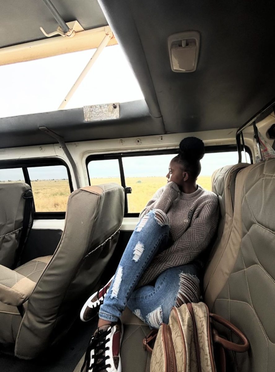 Senior Rebecca Balibuno riding in a bus in the DR Congo, her homeland, feeling the nostalgla and memories of her homeland where she was raised until last year when she moved to America at the age of 15.