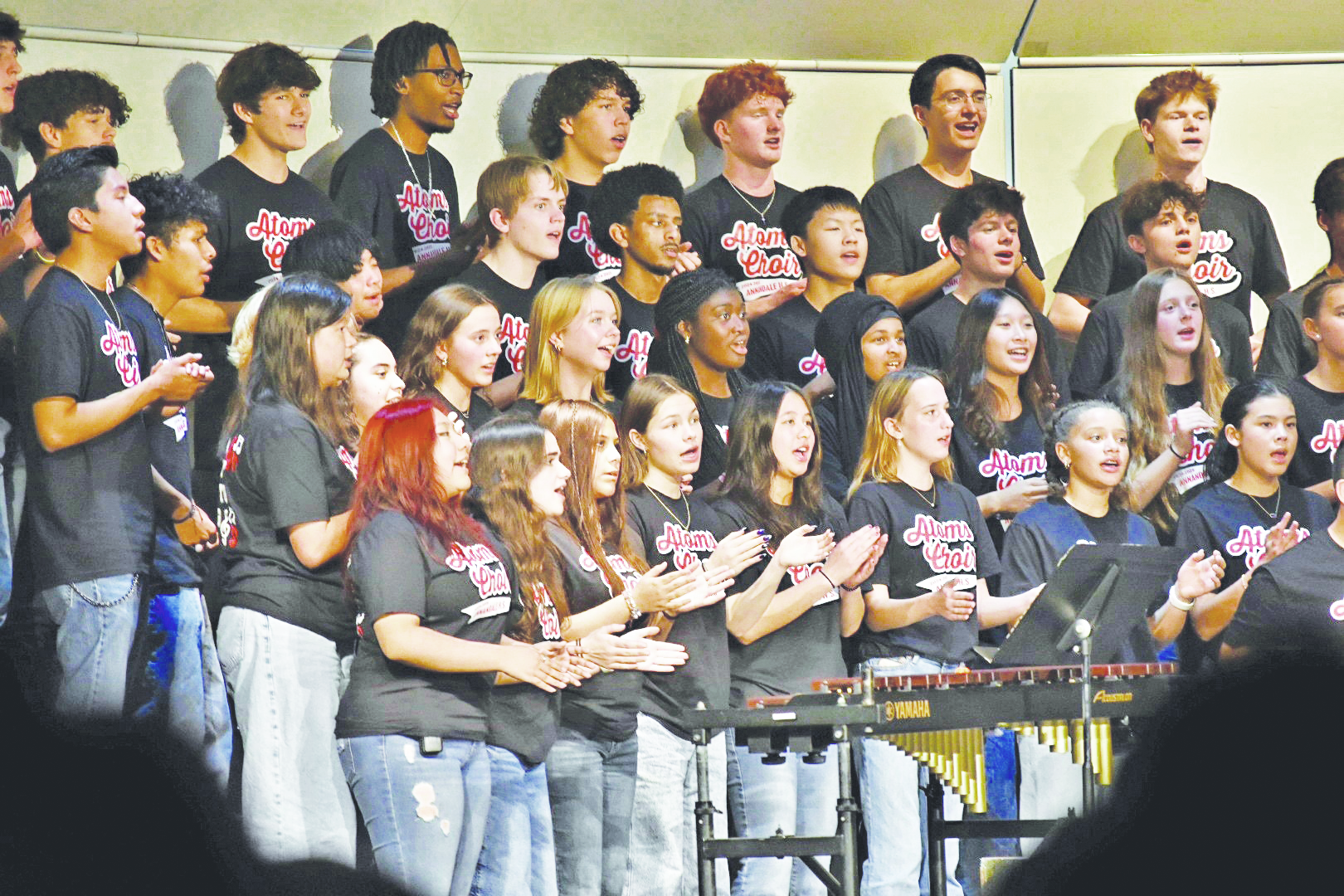 The full chorus program sings their opening number for their fall concert: “A Lovely Day,” their first concert of the year, on Oct. 22 in the AHS Watson Auditorium.