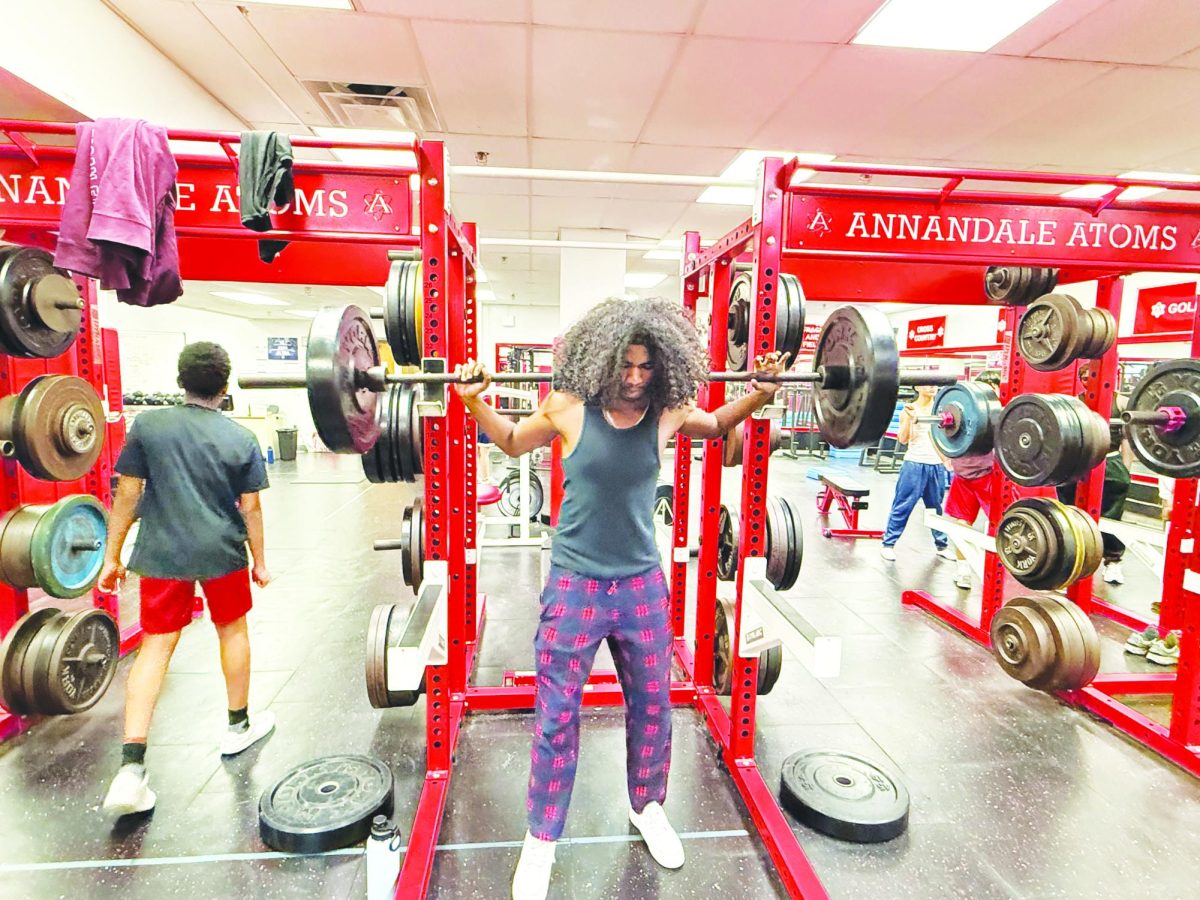 Junior Steffon Jagerssar prepares for a barbell back squat in his personal fitness class, one of the lesser-known electives. 